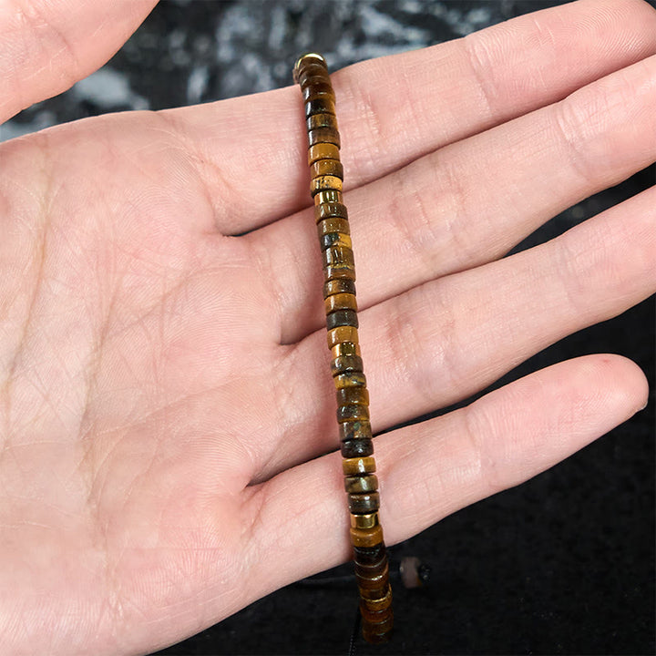 Pulsera de coraje con cuentas espaciadoras de ojo de tigre natural de Buddha Stones