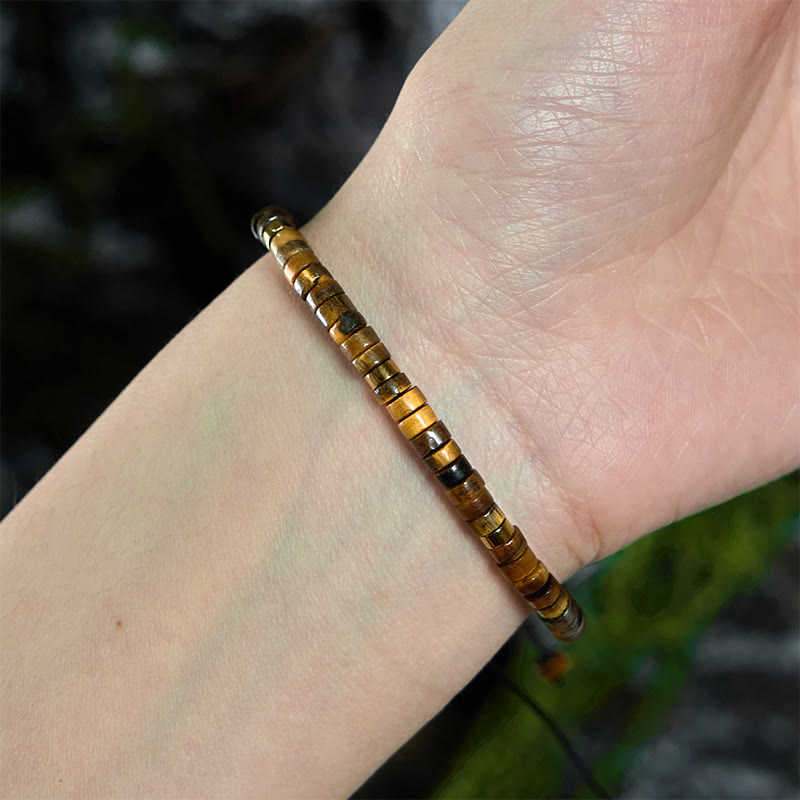 Pulsera de coraje con cuentas espaciadoras de ojo de tigre natural de Buddha Stones