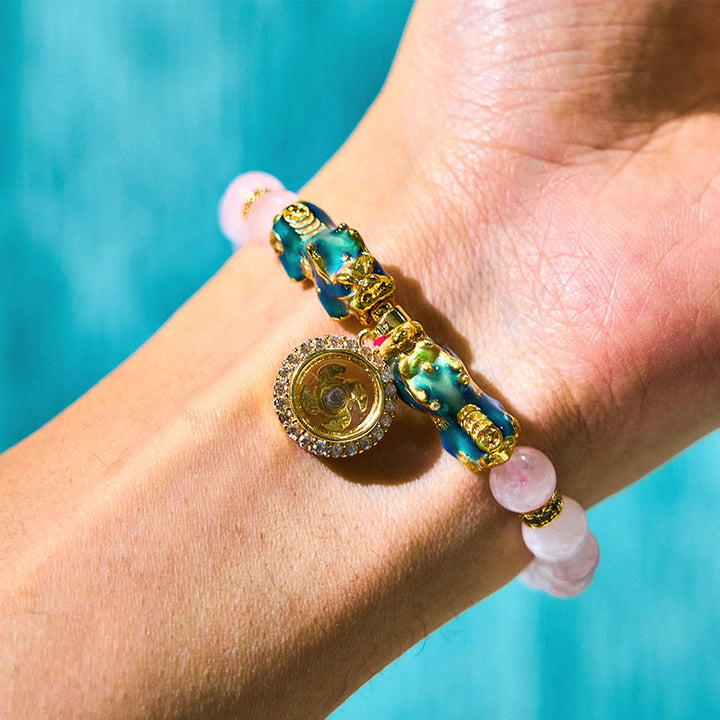 Pulsera cálida con dije de ciclón PiXiu doble que cambia de color con cristales rosas de Buddha Stones