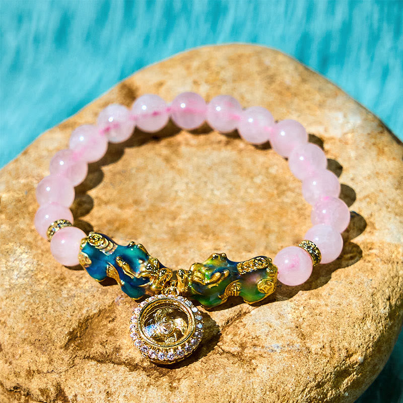 Pulsera cálida con dije de ciclón PiXiu doble que cambia de color con cristales rosas de Buddha Stones