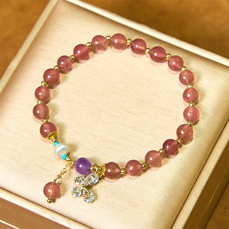 Pulsera con dije de mariposa de cuarzo fresa natural y cuarzo fresa verde de Buddha Stones