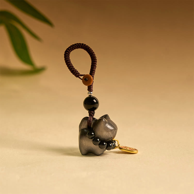 Buddha Stones, obsidiana plateada brillante, obsidiana negra, obsidiana dorada brillante, lindo gato Fu, llavero protector, decoración colgante para teléfono. - Llavero de obsidiana con brillo plateado - image 1