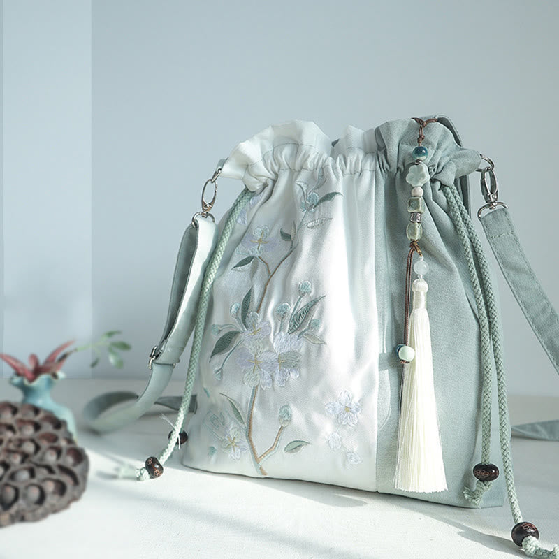 Bolso bandolera de lona con bordado de Buddha Stones, verde pera y epifilo azul.