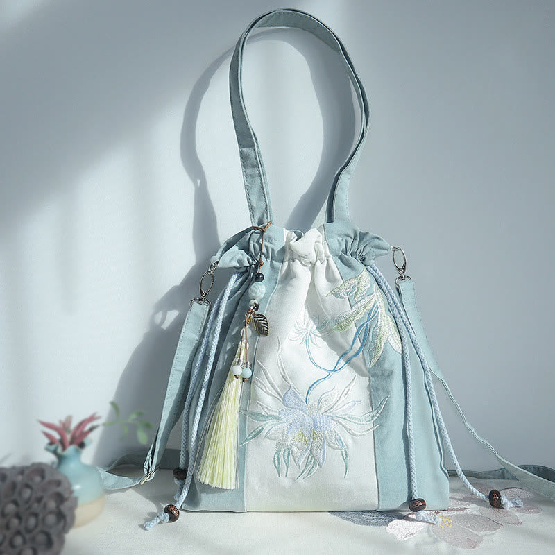 Bolso bandolera de lona con bordado de Buddha Stones, verde pera y epifilo azul.