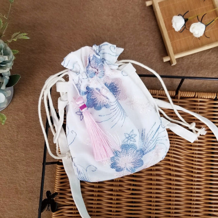 Bolso bandolera de lona con Buddha Stones , flores bordadas y flores de cerezo enredaderas.