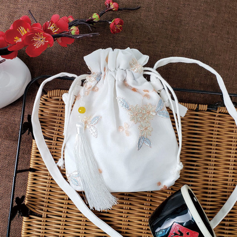 Bolso bandolera de lona con Buddha Stones , flores bordadas y flores de cerezo enredaderas.