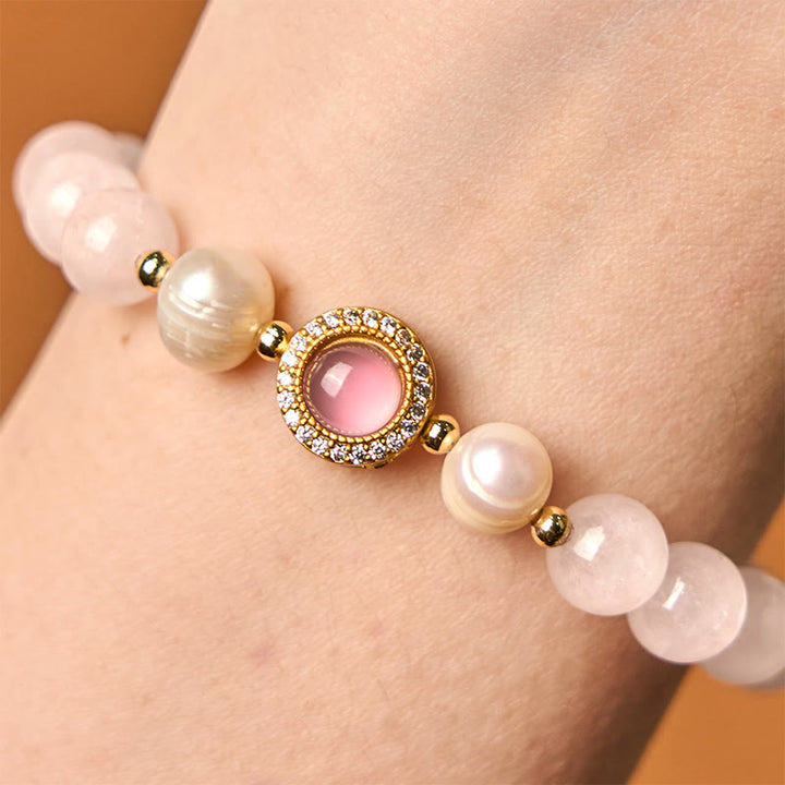 Pulsera de perlas de cristal rosa y Buddha Stones que aporta calidez