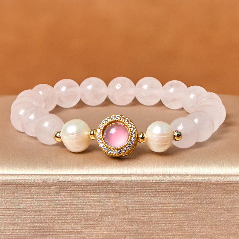 Pulsera de perlas de cristal rosa y Buddha Stones que aporta calidez