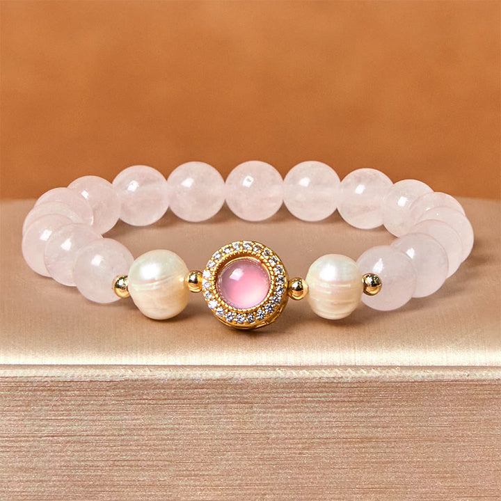 Pulsera de perlas de cristal rosa y Buddha Stones que aporta calidez