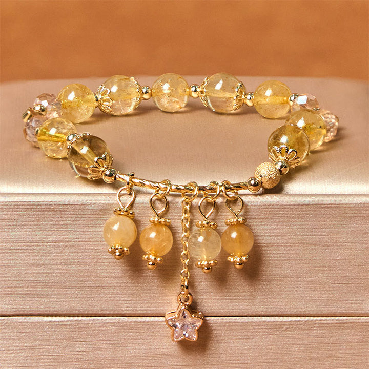 Pulsera de auspiciosidad con trébol de cuatro hojas y estrella de cuarzo rutilado amarillo de color natural de Buddha Stones