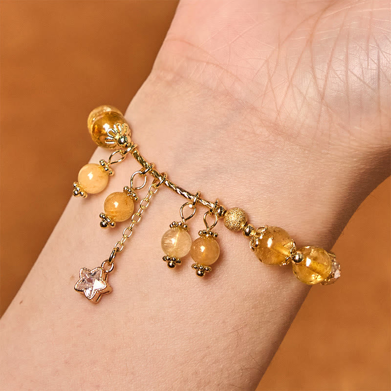 Pulsera de auspiciosidad con trébol de cuatro hojas y estrella de cuarzo rutilado amarillo de color natural de Buddha Stones