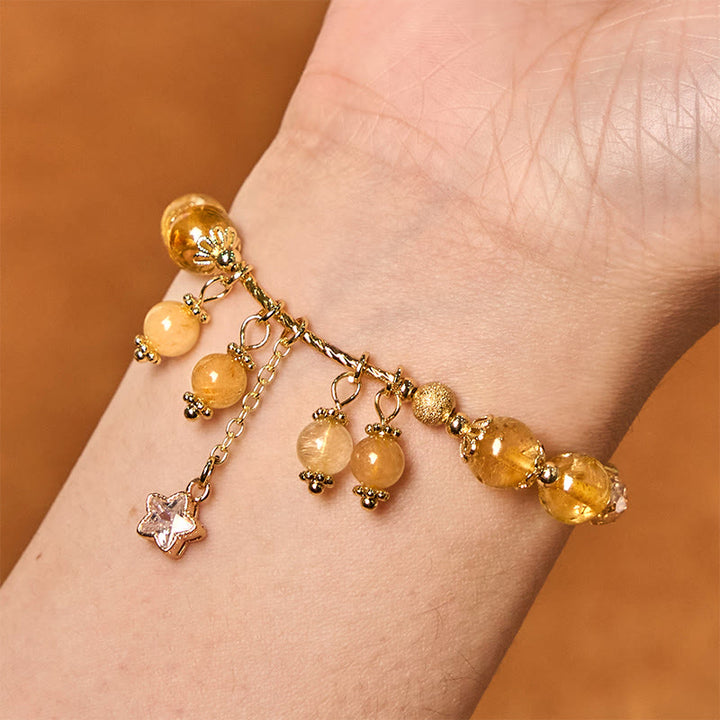 Pulsera de auspiciosidad con trébol de cuatro hojas y estrella de cuarzo rutilado amarillo de color natural de Buddha Stones
