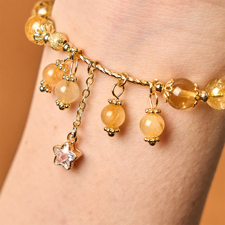 Pulsera de auspiciosidad con trébol de cuatro hojas y estrella de cuarzo rutilado amarillo de color natural de Buddha Stones