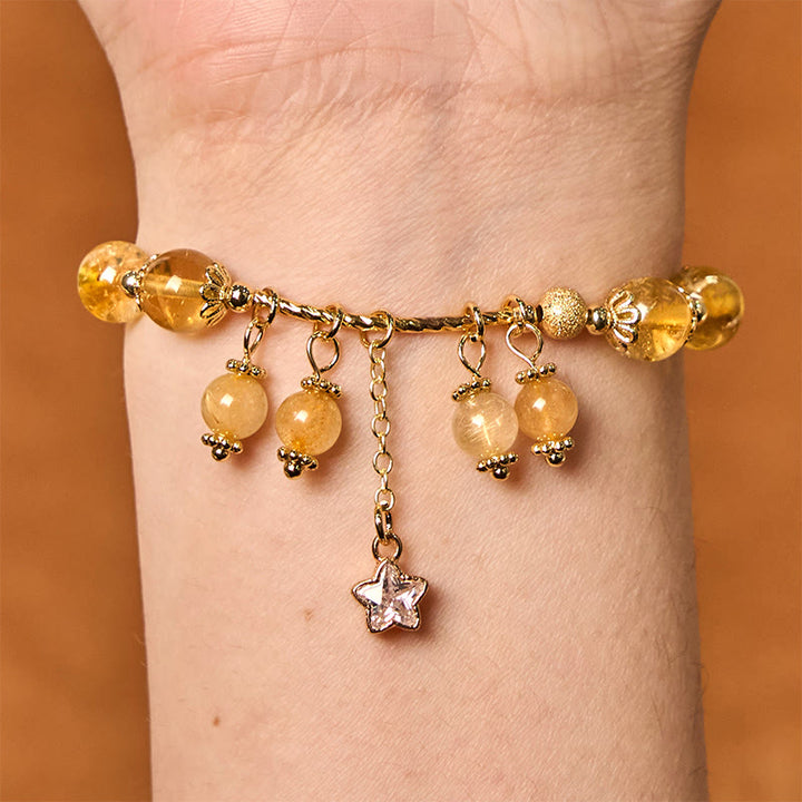Pulsera de auspiciosidad con trébol de cuatro hojas y estrella de cuarzo rutilado amarillo de color natural de Buddha Stones