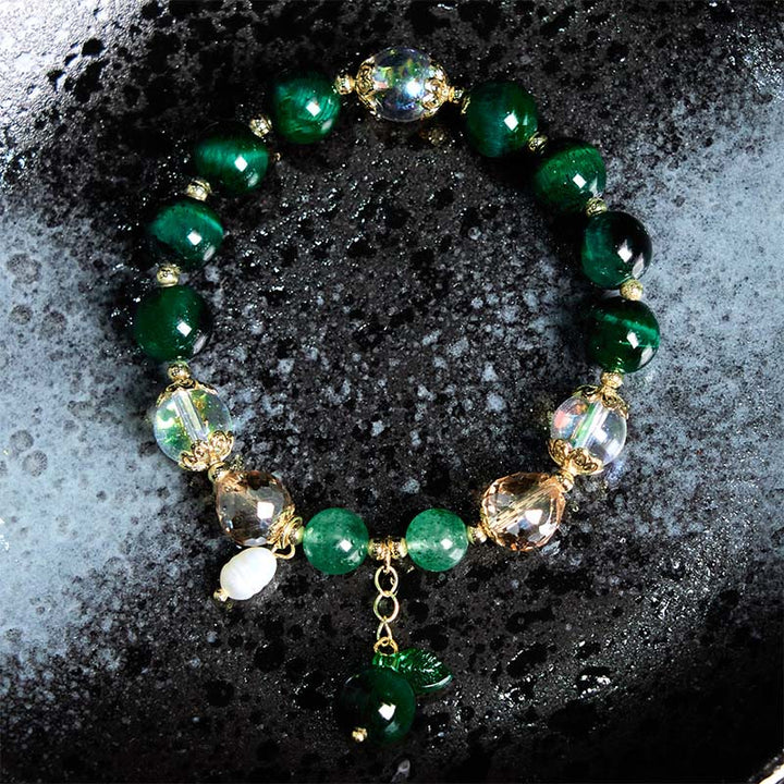 Pulsera positiva con cuentas de ojo de tigre verde natural de Buddha Stones y hoja verde