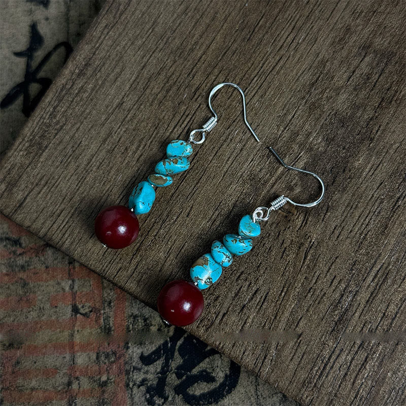 Pendientes de protección con cuentas de cinabrio turquesa y Buddha Stones tibetanas de plata de ley 925