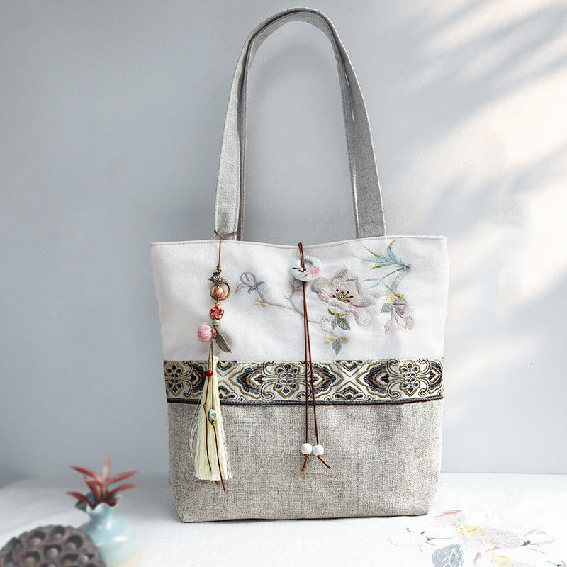 Bolso de hombro de lona y poliéster con bordado de magnolia y Buddha Stones