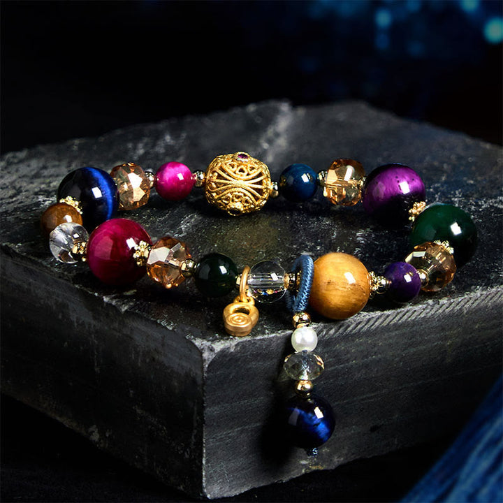 Pulsera de equilibrio de peso con piedra de ojo de tigre de color natural de Buddha Stones