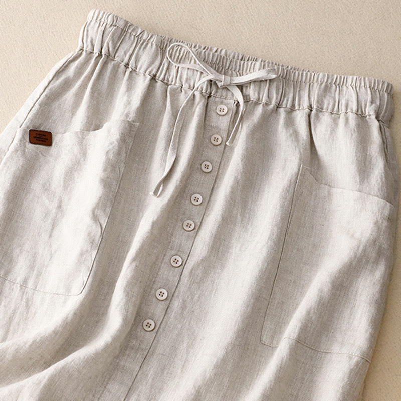 Falda de lino y algodón con bolsillos y diseño de abertura con botones y cordones de Buddha Stones Spring para mujer - image 1