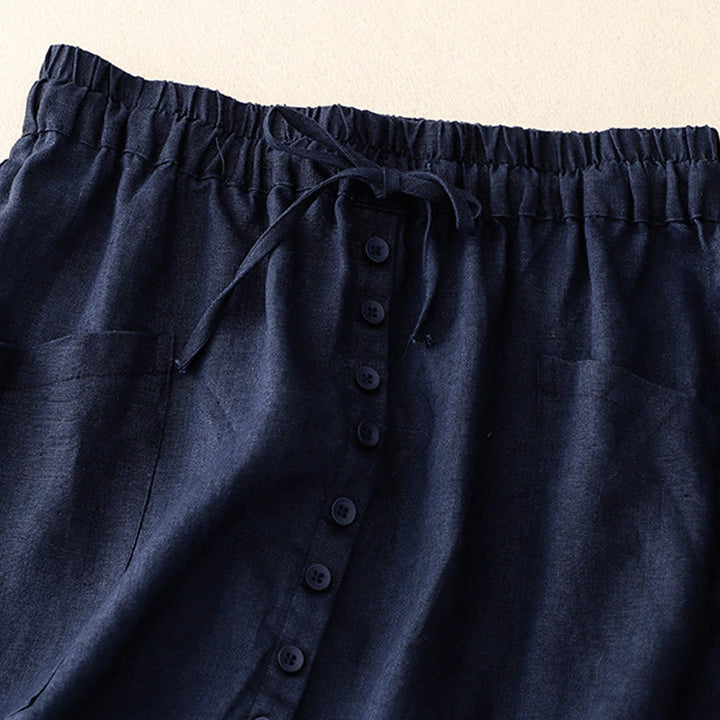 Falda de lino y algodón con bolsillos y diseño de abertura con botones y cordones de Buddha Stones Spring para mujer - image 5