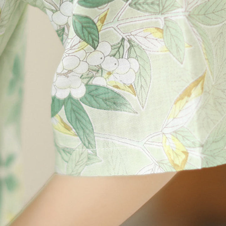 Vestido cheongsam chino de lino y algodón jacquard con estampado floral de Buddha Stones y media manga, con bolsillos - image 9