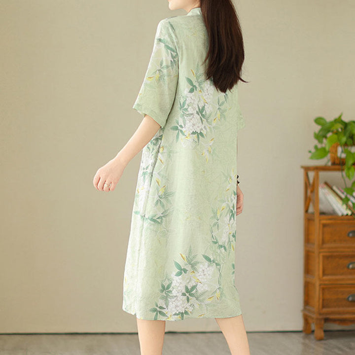 Vestido cheongsam chino de lino y algodón jacquard con estampado floral de Buddha Stones y media manga, con bolsillos - image 1