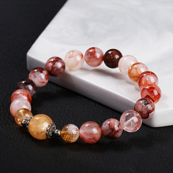 Pulsera de equilibrio con cuentas de cuarzo hematoide rojo natural de Buddha Stones