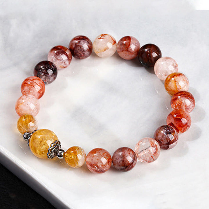 Pulsera de equilibrio con cuentas de cuarzo hematoide rojo natural de Buddha Stones
