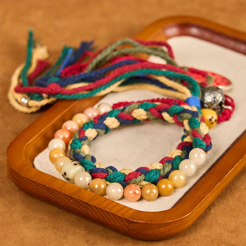 Pulsera de borlas de cuerda de color de doble capa de calcedonia colorida con Buddha Stones y fantasmas de montaña tibetanos que gastan dinero