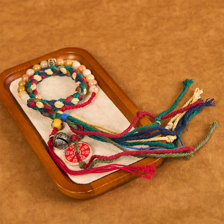 Pulsera de borlas de cuerda de color de doble capa de calcedonia colorida con Buddha Stones y fantasmas de montaña tibetanos que gastan dinero