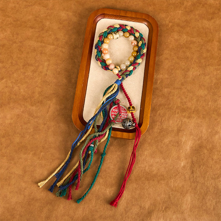 Pulsera de borlas de cuerda de color de doble capa de calcedonia colorida con Buddha Stones y fantasmas de montaña tibetanos que gastan dinero
