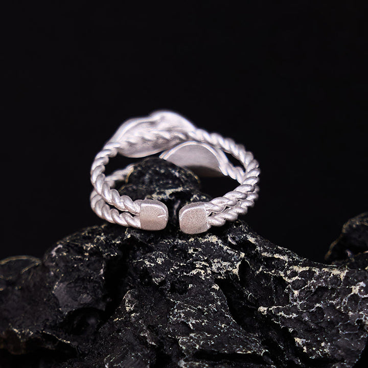 Anillo ajustable de riqueza con hoja de cobre y piedra de Buda