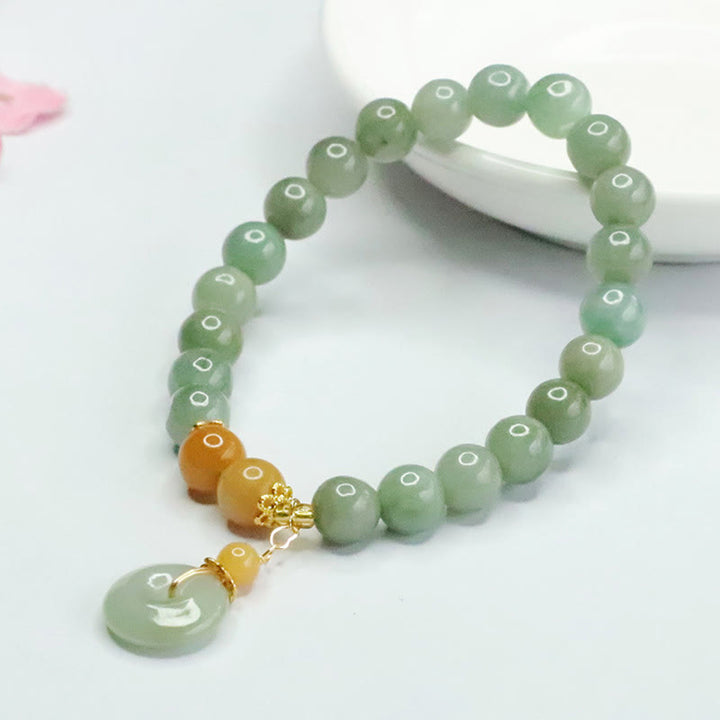 Pulsera de prosperidad y abundancia con cuentas de jade y Buddha Stones - image 2