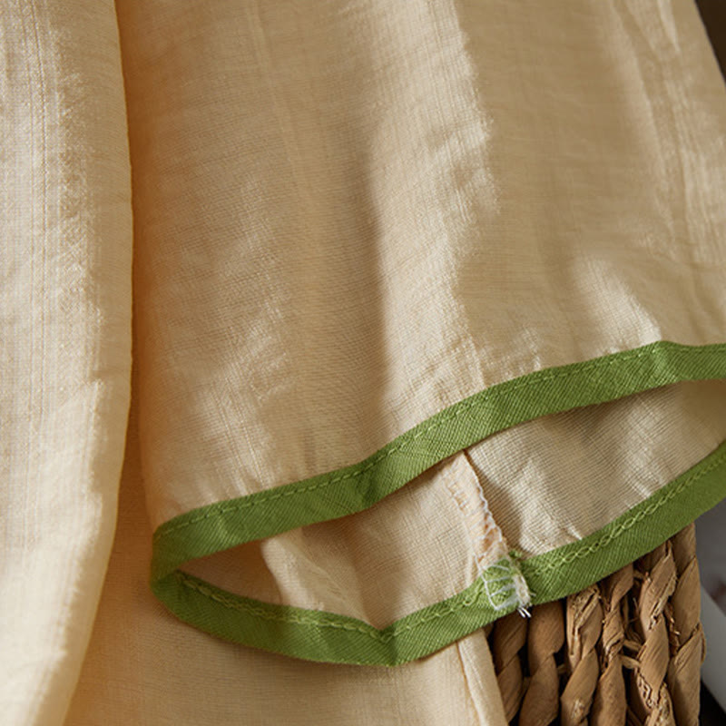 Camisa informal de lino y algodón con manga tres cuartos y diseño de flores bordadas con botones de rana para mujer - image 9