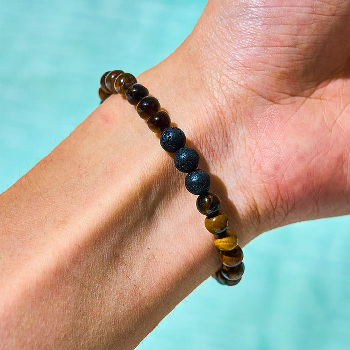 Juego de 3 pulseras protectoras de piedra de lava y ojo de tigre de Buddha Stones