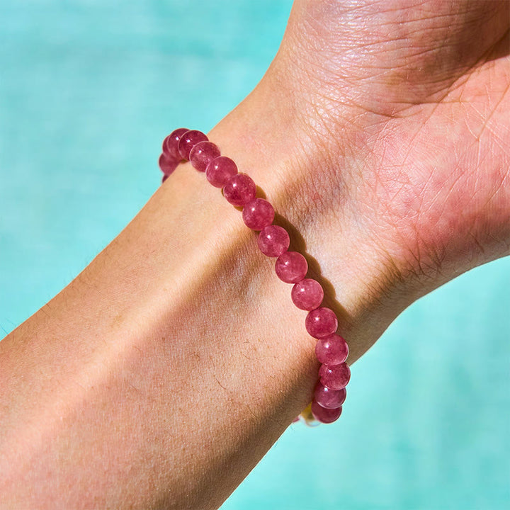 Pulsera curativa de Buddha Stones de cuarzo fresa, perla, gato y conejo - image 10
