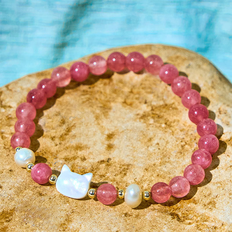 Pulsera curativa de Buddha Stones de cuarzo fresa, perla, gato y conejo - image 9
