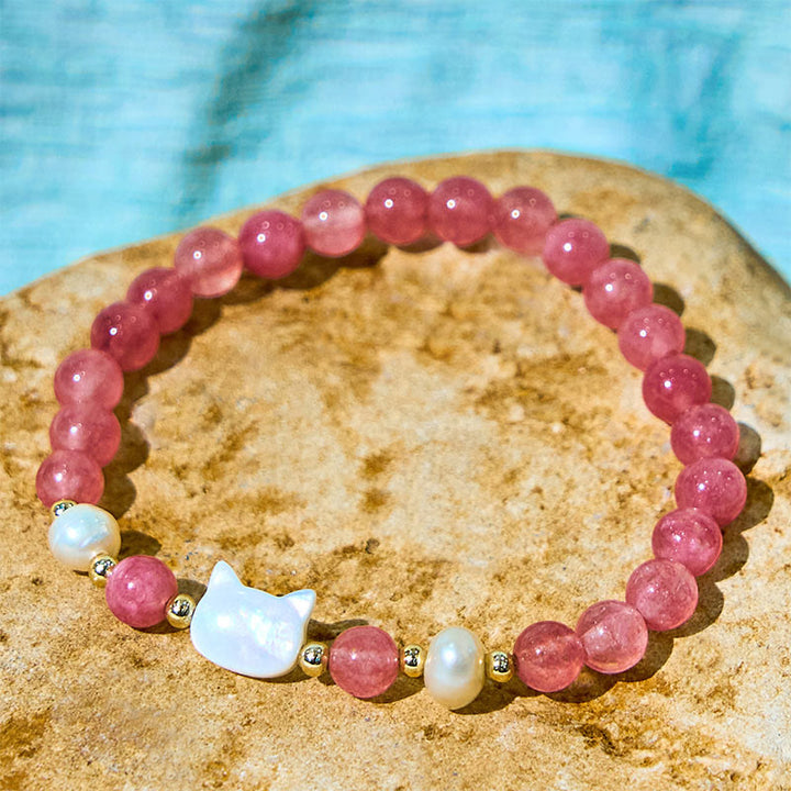 Pulsera curativa de Buddha Stones de cuarzo fresa, perla, gato y conejo - image 9