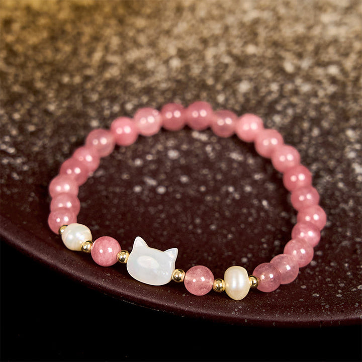 Pulsera curativa de Buddha Stones de cuarzo fresa, perla, gato y conejo - image 7