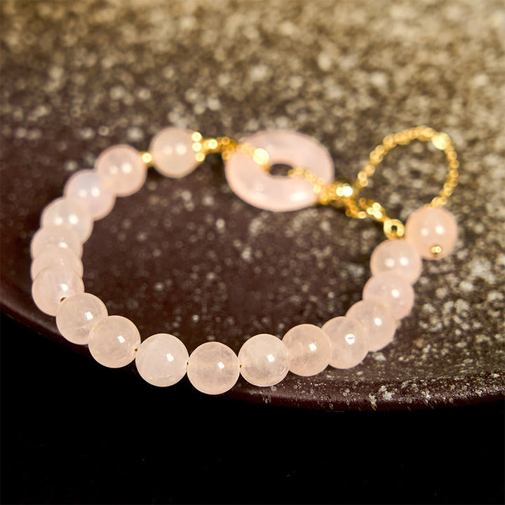Pulsera de autoaceptación con hebilla de paz y cuentas de cristal rosa natural de Buddha Stones