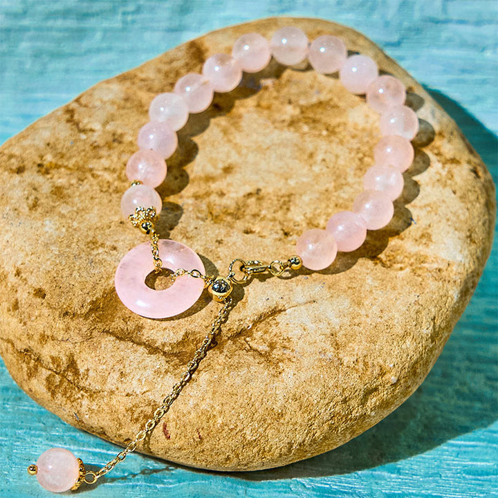 Pulsera de autoaceptación con hebilla de paz y cuentas de cristal rosa natural de Buddha Stones