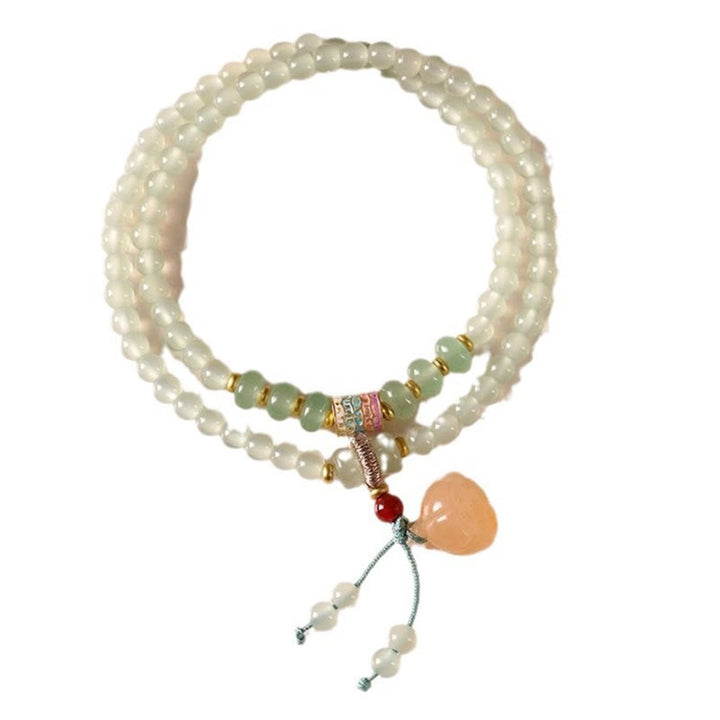 Pulsera de positividad con múltiples círculos de Buddha Stones, aventurina natural, vainas de loto y bambú de la suerte.
