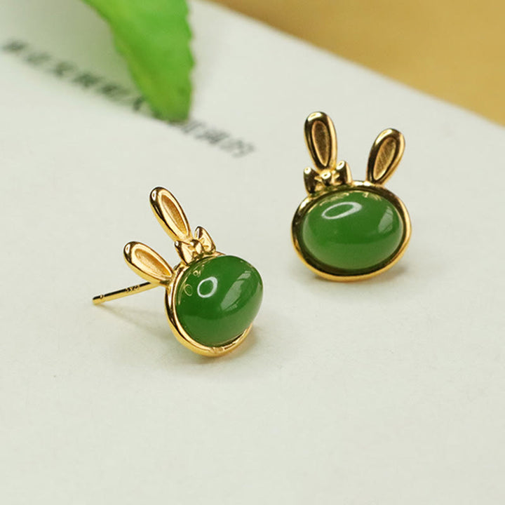 Pendientes de botón con forma de conejo de la suerte y Buddha Stones en plata de ley 925 con jade cian hetiano