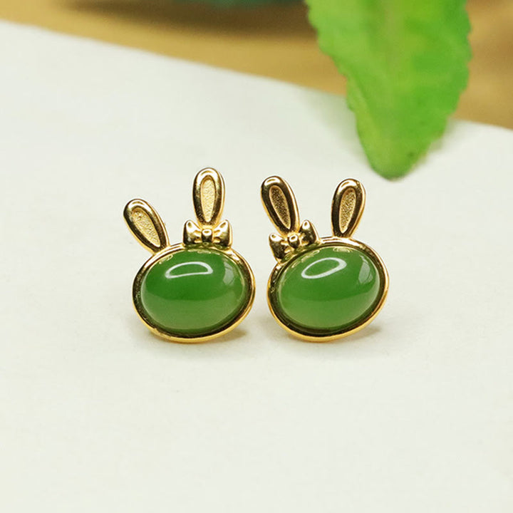 Pendientes de botón con forma de conejo de la suerte y Buddha Stones en plata de ley 925 con jade cian hetiano