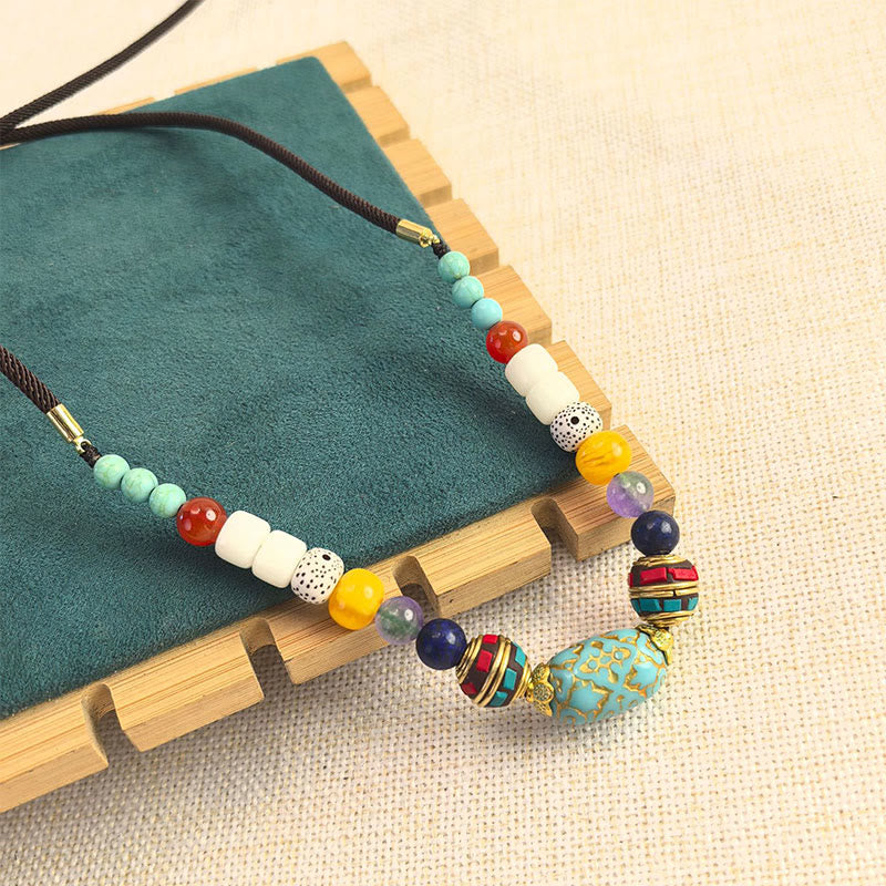Collar con colgante de equilibrio de cuentas turquesas tibetanas hechas a mano con Buddha Stones - image 1
