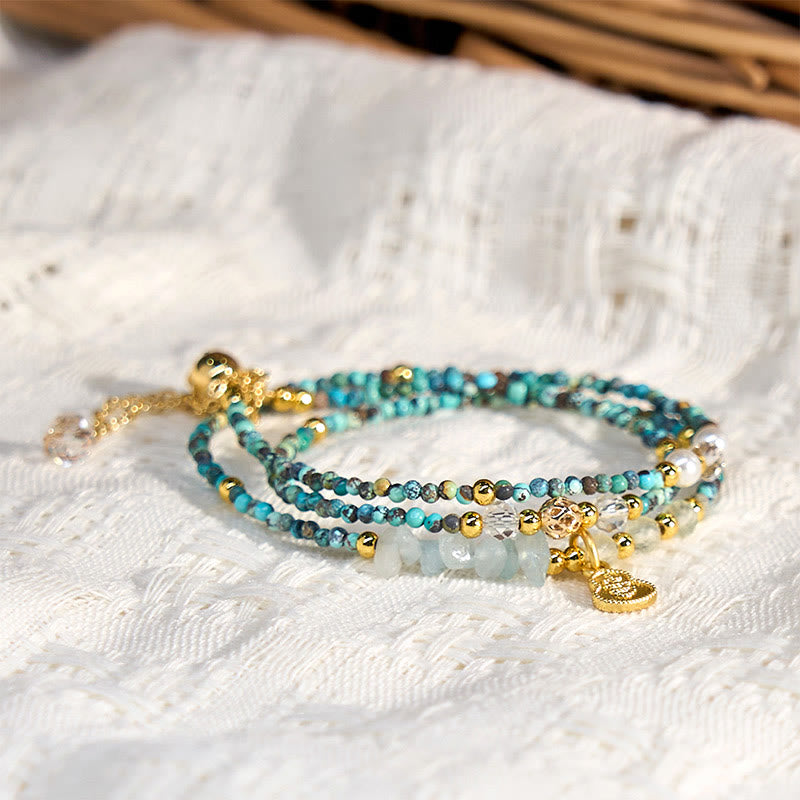 Pulsera de triple vuelta con cuentas de turquesa y Buddha Stones