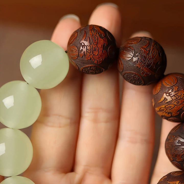 Pulsera de curación con el personaje Pixiu Fu grabado en madera de sappan con Buddha Stones