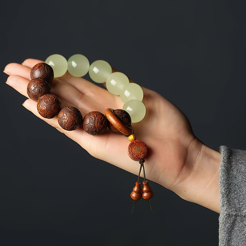 Pulsera de curación con el personaje Pixiu Fu grabado en madera de sappan con Buddha Stones
