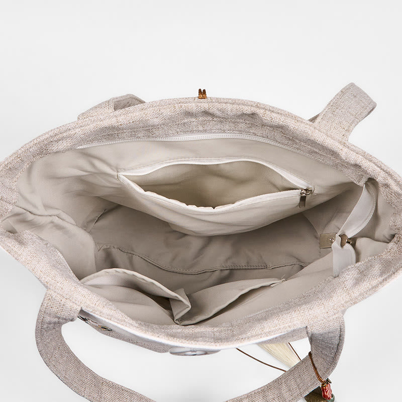 Bolso de hombro de lona y poliéster con bordado de magnolia y Buddha Stones