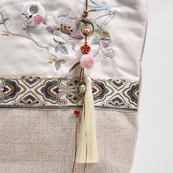 Bolso de hombro de lona y poliéster con bordado de magnolia y Buddha Stones